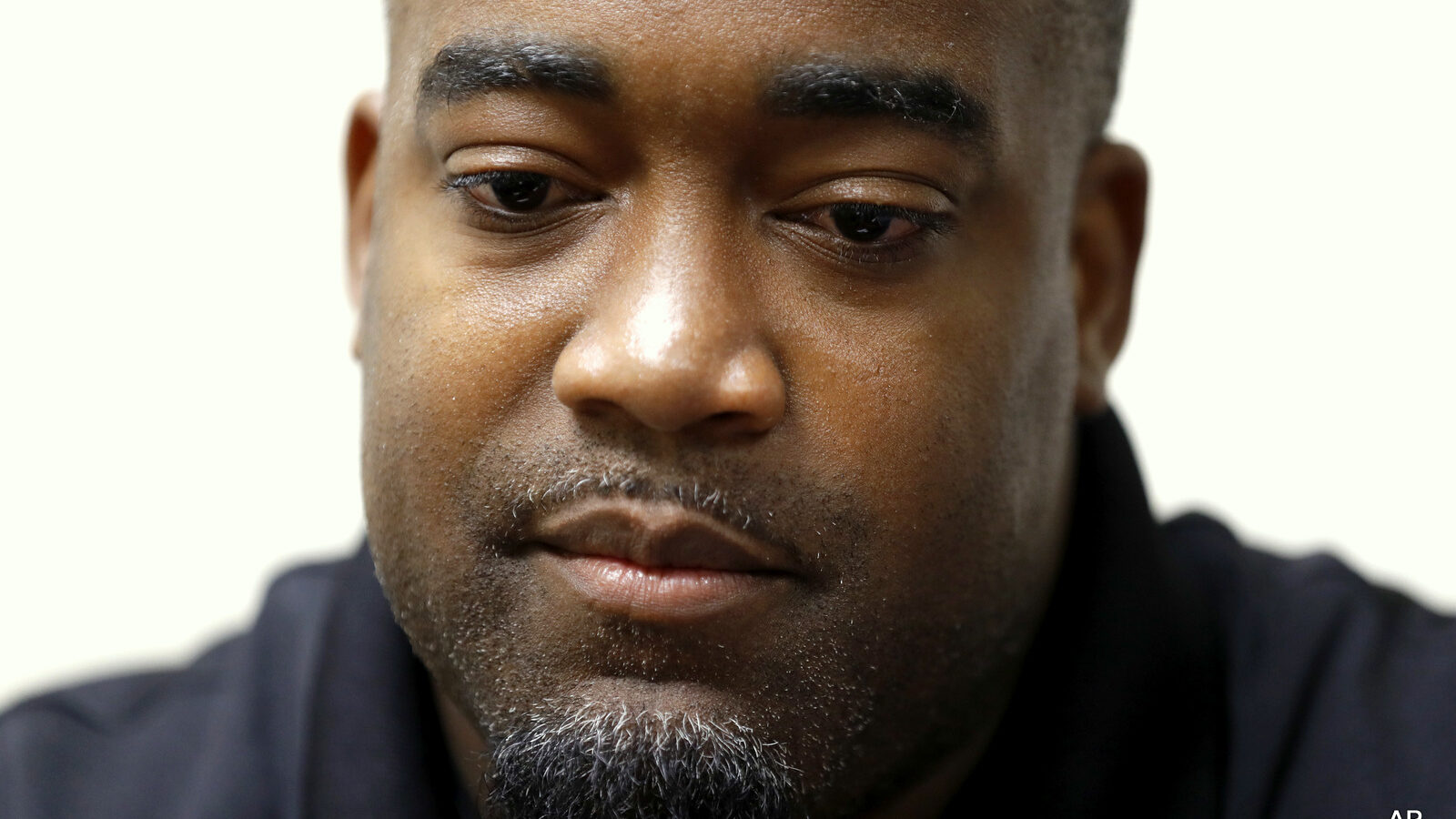 Mark Hughes takes part in an interview at his attorney's office, Saturday, July 9, 2016, in Dallas. Hughes was mistaken early as a suspect by the Dallas Police Department after five police officers were killed in downtown Dallas Thursday night.