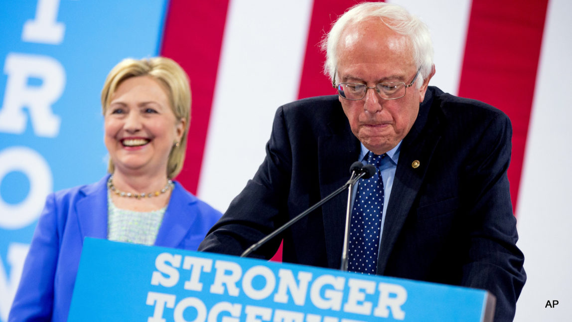 Sen. Bernie Sanders, I-Vt., accompanied by Democratic presidential candidate Hillary Clinton, speaks during a rally in Portsmouth, N.H., Tuesday, July 12, 2016, where Sanders endorsed Clinton for president.