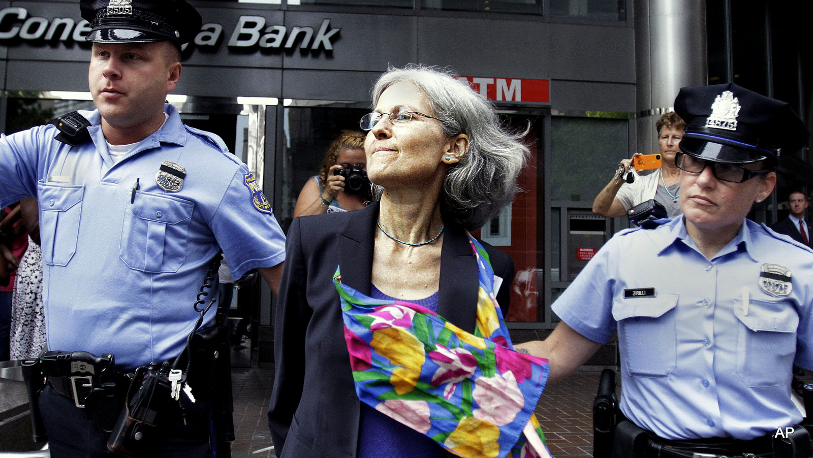 Green Party presidential nominee Jill Stein, is transported in restraints to be arrested after a sit-in at a downtown Philadelphia bank over housing foreclosures. 