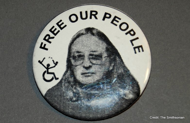 Wade Blank, shown on this “Free Our People” button, was a Presbyterian minister and outspoken activist. In the 1970s, Blank’s work in a Denver nursing home, combined with his earlier experience in civil rights, led to the founding of both the Atlantis Independent Living Center and ADAPT, a grassroots pan-disability activist organization. 