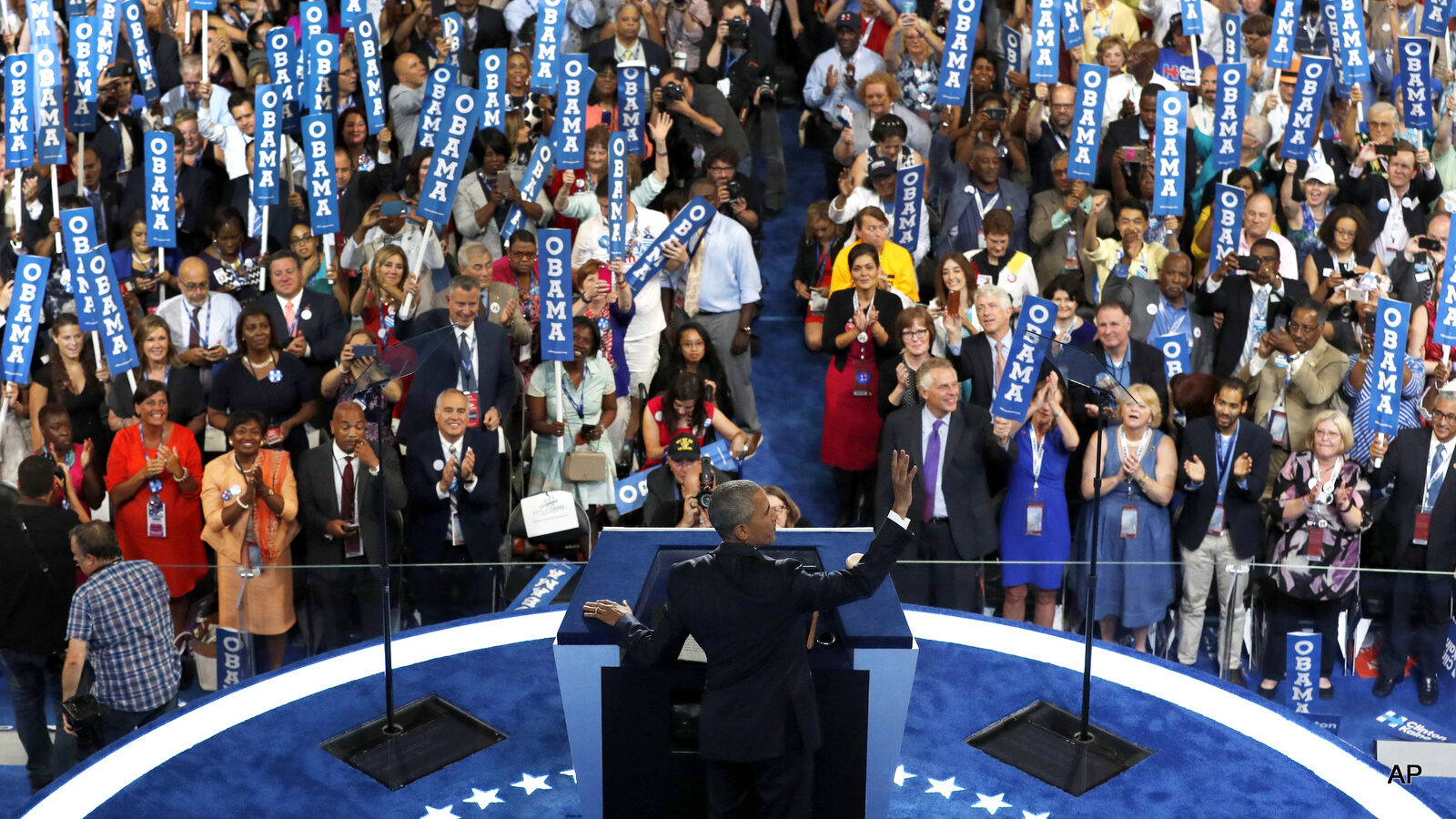 President Barack Obama waves to the delegates before speaking during the third day of the Democratic National Convention in Philadelphia , Wednesday, July 27, 2016.