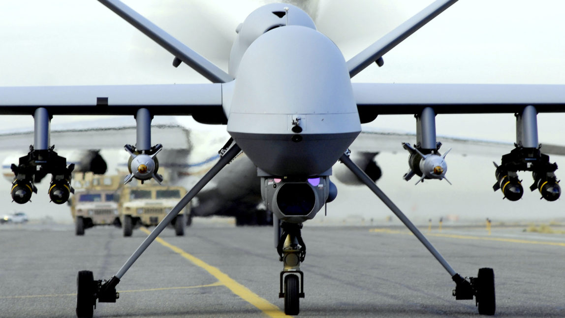 A fully armed MQ-9 Reaper taxis down an Afghanistan runway. (U.S. Air Force photo/Staff Sgt. Brian Ferguson)