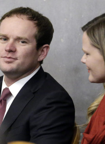 Rep. Jeremy Durham, R-Franklin, center, talks with his wife, Dr. Jessica Durham, before a House Republican caucus meeting on the opening day of the second session of the 109th General Assembly Tuesday, Jan. 12, 2016, in Nashville, Tenn. Durham has survived an effort to oust him from his leadership role among state House Republicans. House Republicans voted to eject the media from their caucus meeting Tuesday before a motion to remove Durham as majority whip failed to receive two-thirds of the vote in a secret ballot.