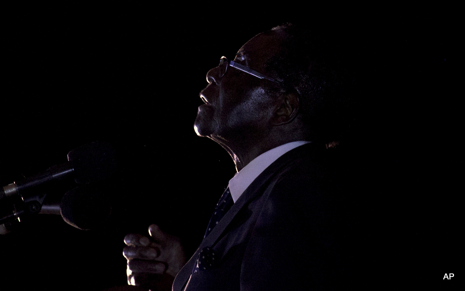 Zimbabwean President, Robert Mugabe, addresses party supporters at a rally in Bindura about 100 kilometres north east of Harare, Friday, July 8, 2016. 