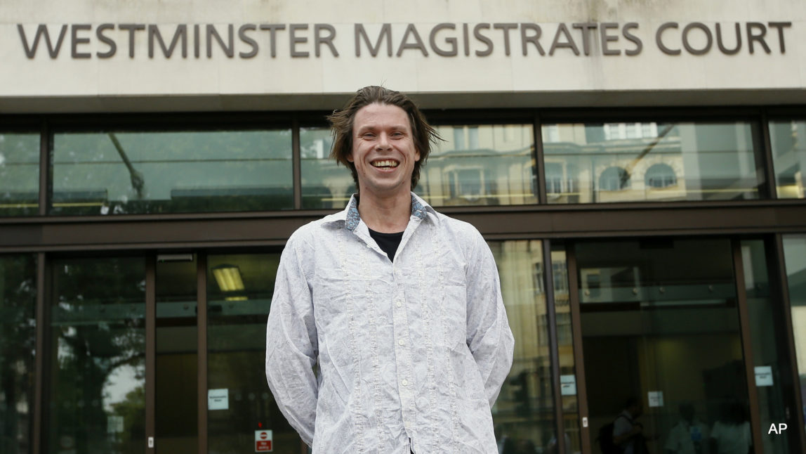 Lauri Love arrives at Westminster Magistrates court in London, Monday, July 25, 2016, where final extradition arguments took place for Love, accused of hacking into US government computer networks.
