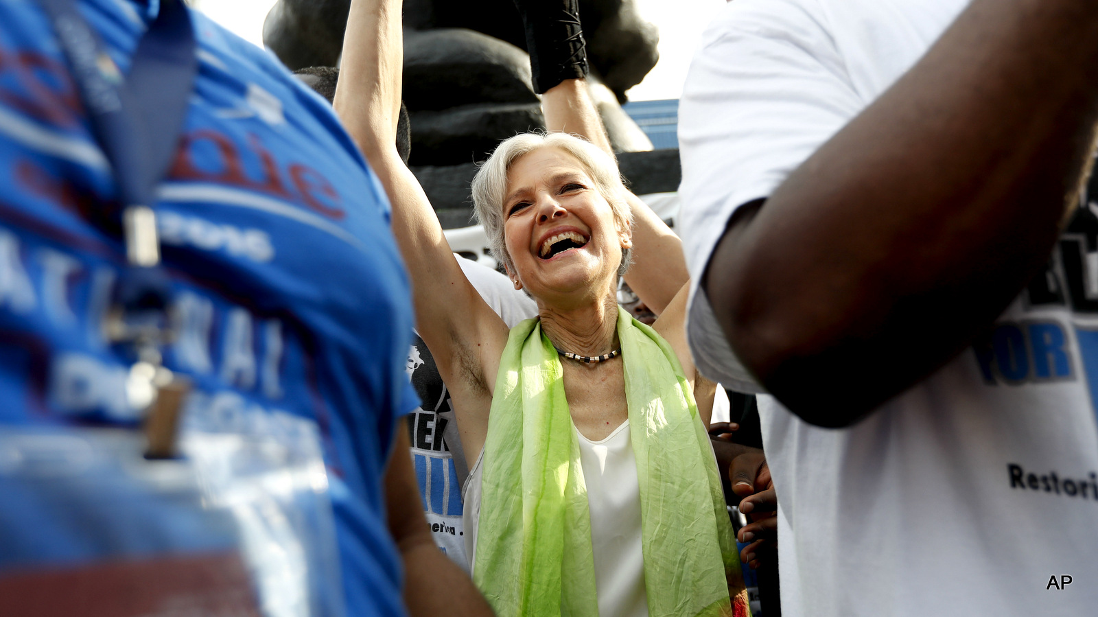 Dr. Jill Stein, presumptive Green Party presidential nominee, waves at a rally in Philadelphia, Wednesday, July 27, 2016, during the third day of the Democratic National Convention. 