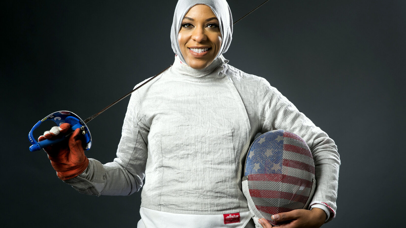 Fencer Ibtihaj Muhammad poses for photos at the 2016 Team USA Media Summit Wednesday, March 9, 2016, in Beverly Hills, Calif.