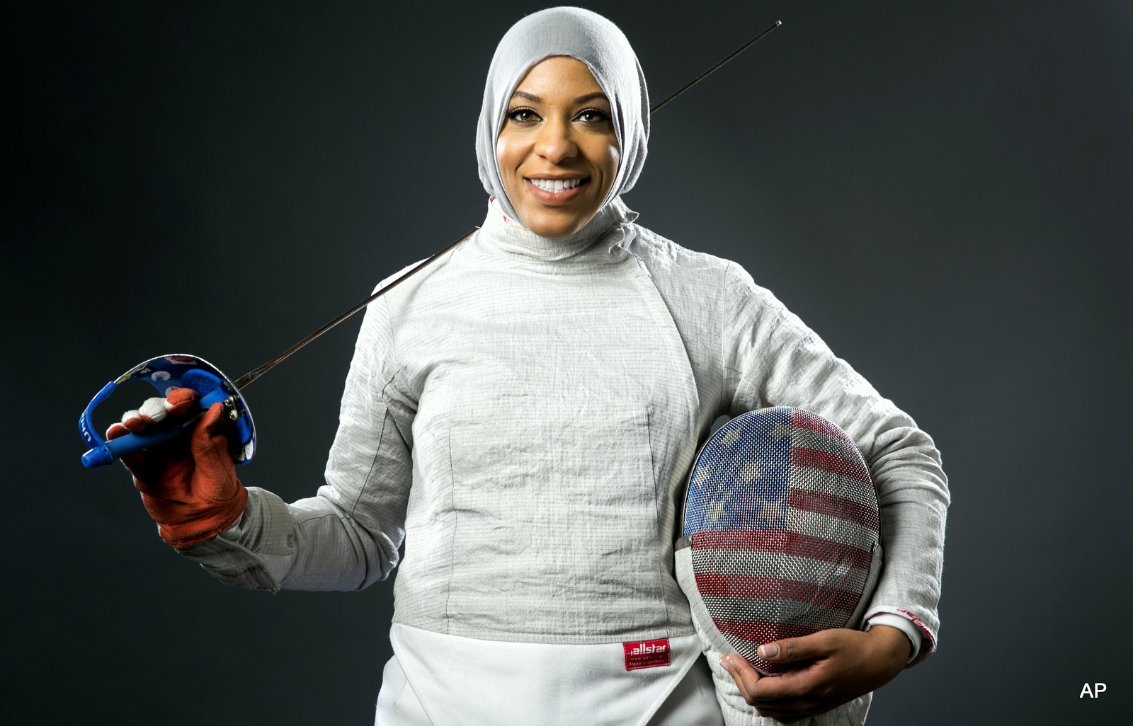 Fencer Ibtihaj Muhammad poses for photos at the 2016 Team USA Media Summit Wednesday, March 9, 2016, in Beverly Hills, Calif.