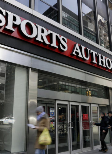 People enter a Sports Authority store, in New York, Wednesday, March 2, 2016.