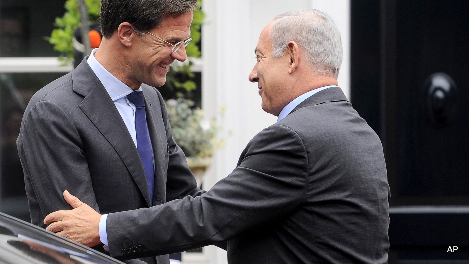 Israel's Prime Minister Benjamin Netanyahu, right, is greeted by Dutch Prime Minister Mark Rutte prior to a meeting in The Hague, Netherlands, Tuesday, Sept. 6, 2016. 