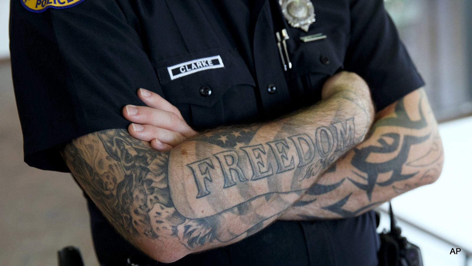 A Miami police officer stands guard during a campaign event with Republican presidential candidate Donald Trump at the James L. Knight Center, Friday, Sept. 16, 2016, in Miami. 