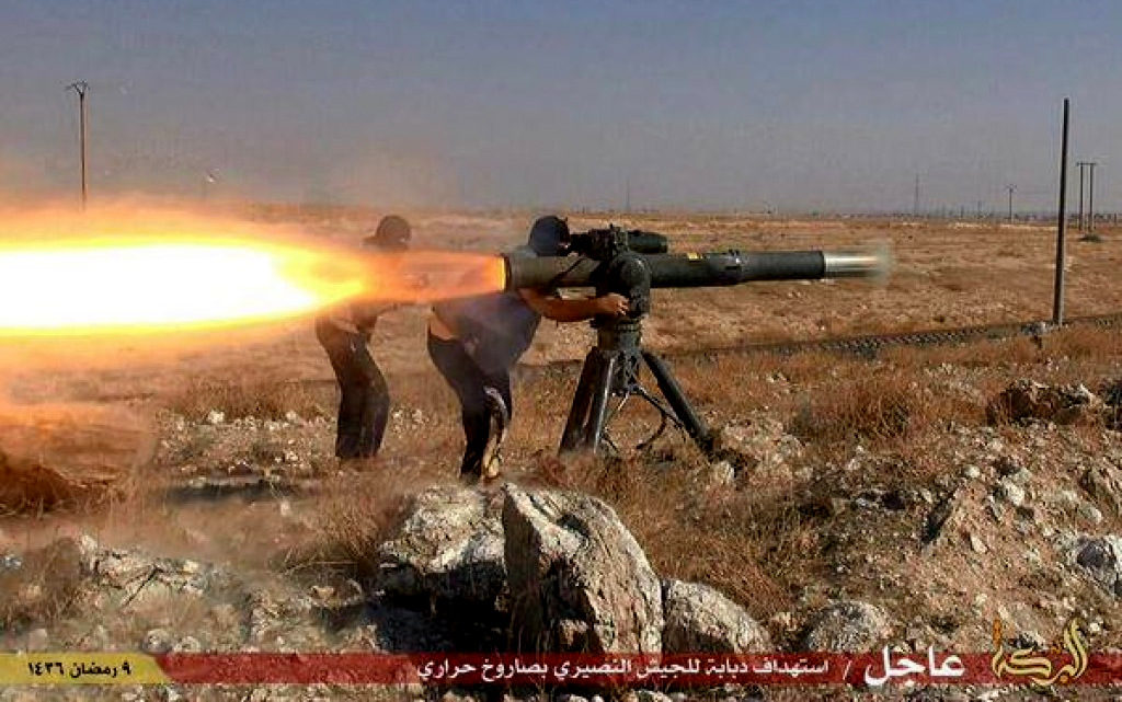 A screenshot showing Syrian rebels using an American made BGM-71 TOW missile.