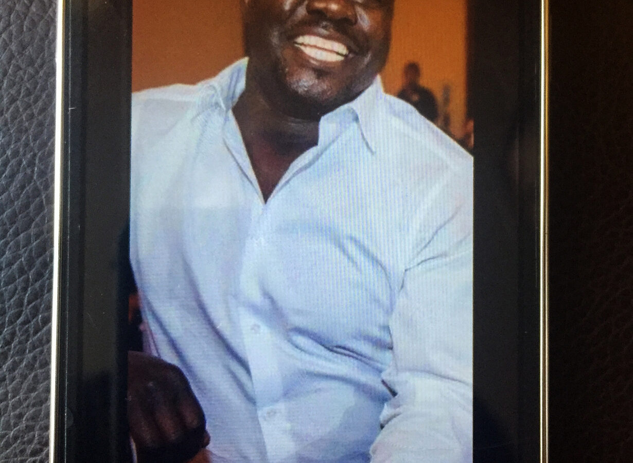 This undated cellphone photo released by Dan Gilleon, the attorney for the family of Alfred Olango, shows Alfred Olango, the Ugandan refugee killed Tuesday, Sept. 27, 2016, in El Cajon, Calif. The fatal police shooting of Olango, who drew something from his pocket and extended his hands in a "shooting stance" happened about a minute after officers in a San Diego suburb arrived at the scene where a mentally unstable man was reportedly walking in traffic, a police spokesman said Wednesday.