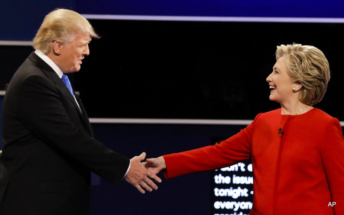 Republican presidential nominee Donald Trump and Democratic presidential nominee Hillary Clinton shake hands during the presidential debate at Hofstra University in Hempstead, N.Y., Monday, Sept. 26, 2016.