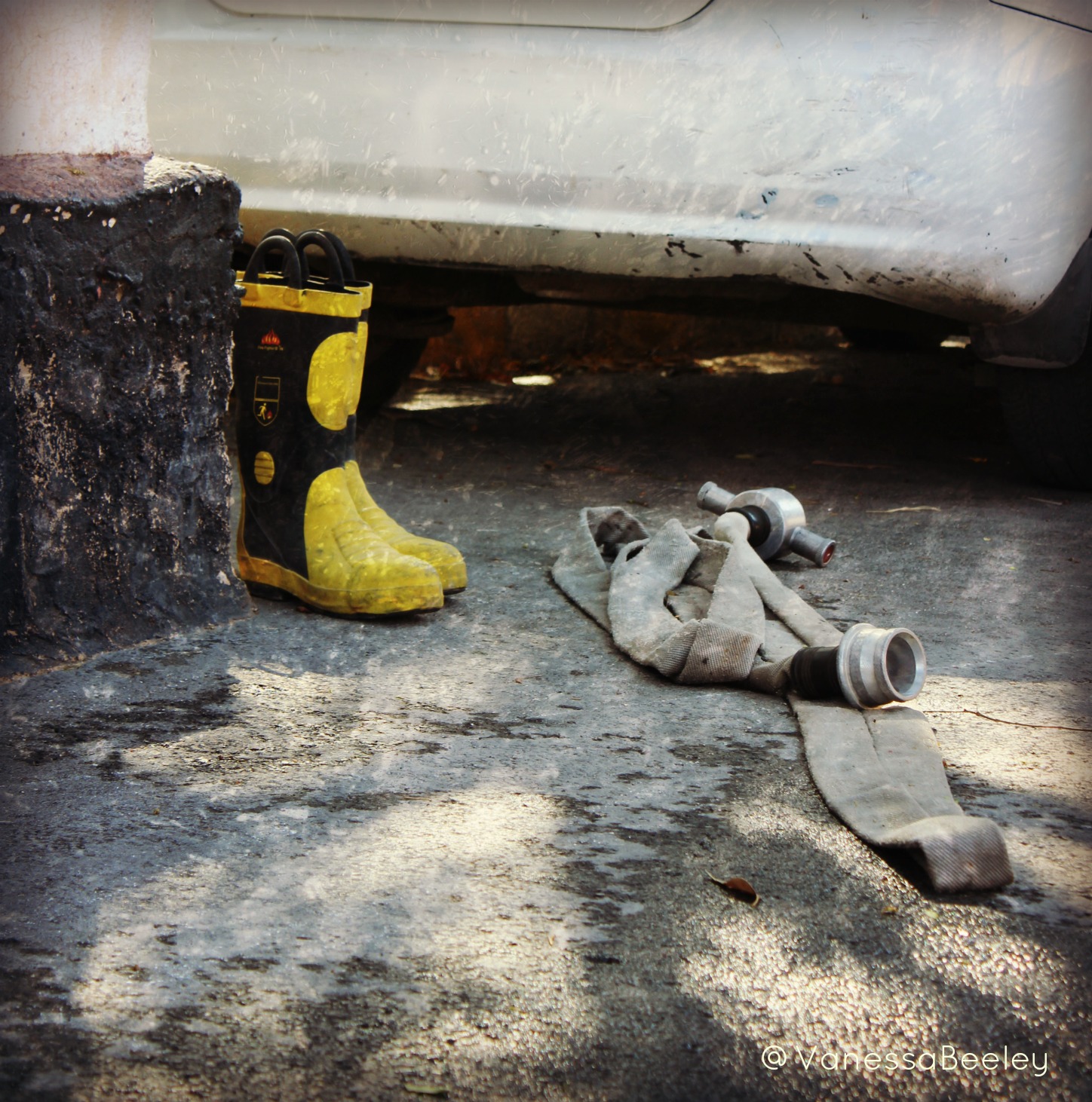 Boots and a fire hose sit in the corner of the yard of the real Syria Civil Defense, waiting for the next call. (Photo: Vanessa Beeley)
