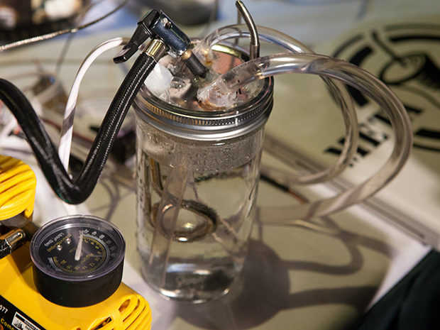 Photo: Stephen Cass The Alpha Version: This automated vessel for pharmaceutical reactions was made from a mason jar. A later prototype adds an Arduino-controlled syringe to introduce reagents and catalysts to in-progress reactions at timed intervals.