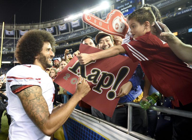 San Francisco 49ers quarterback Colin Kaepernick greets fans after their 31-21 win against the San Diego Chargers during an NFL preseason football game Thursday, Sept. 1, 2016, in San Diego. (AP Photo/Denis Poroy)