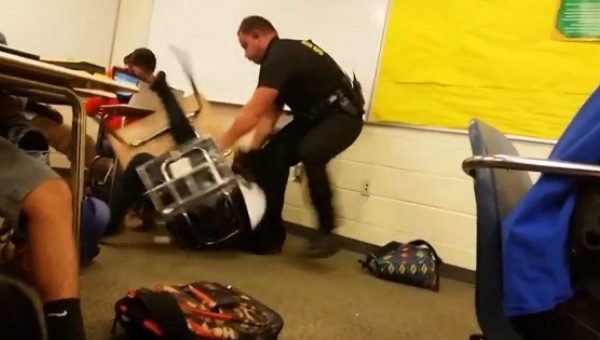 Richland County sheriff's Deputy Ben Fields caught on video at Spring Valley High School violently arresting a young girl. | Photo: Twitter