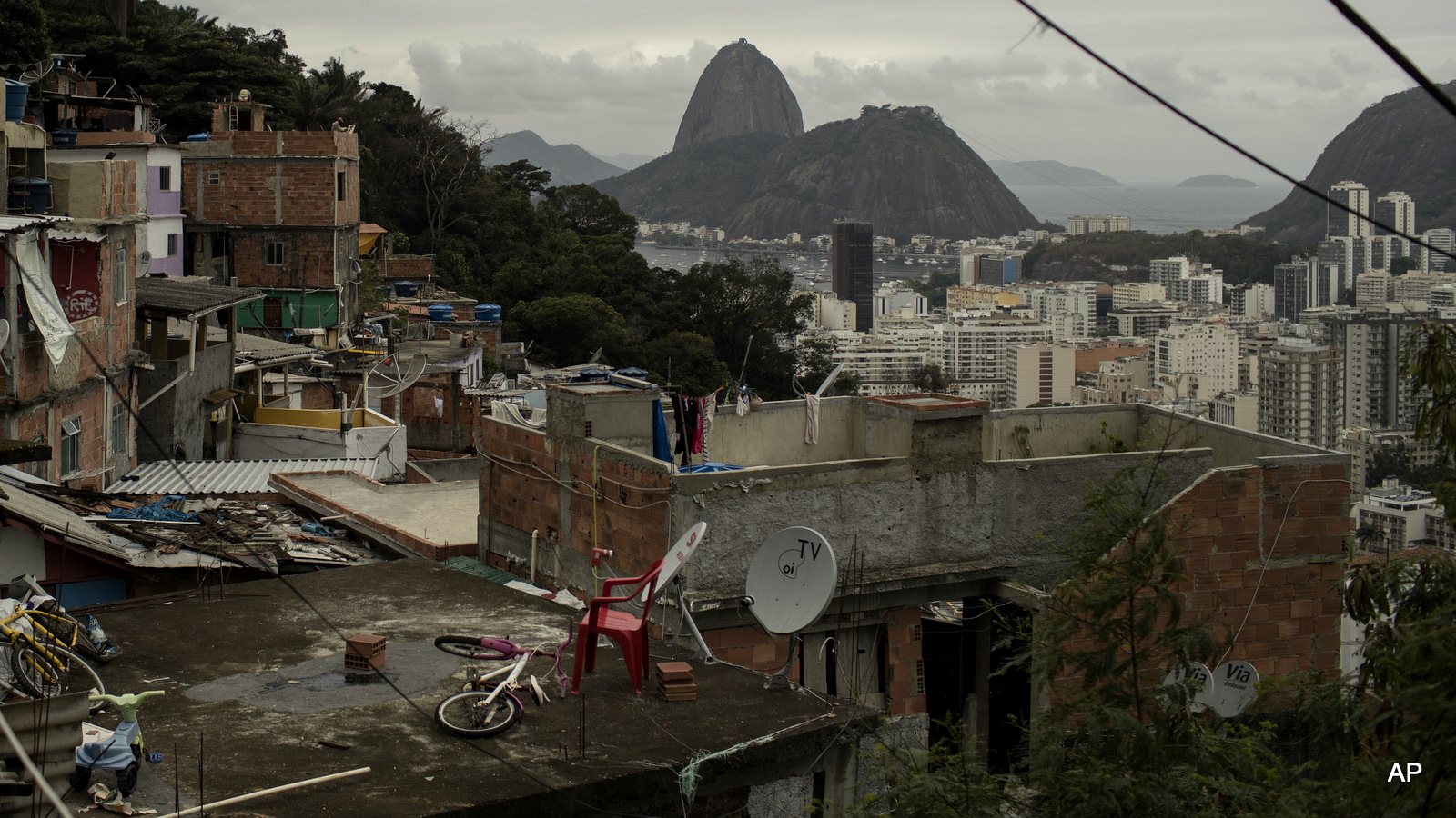 The Sugar Loaf mountain, top right, is pictured from the Dona Marta slum in Rio de Janeiro, Brazil, Wednesday, Aug. 10, 2016. 