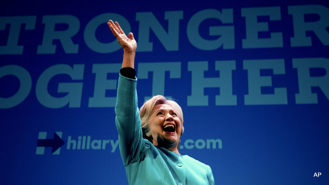 Democratic presidential candidate Hillary Clinton waves as she takes the stage to speak at a fundraiser at the Paramount Theatre in Seattle, Friday, Oct. 14, 2016.