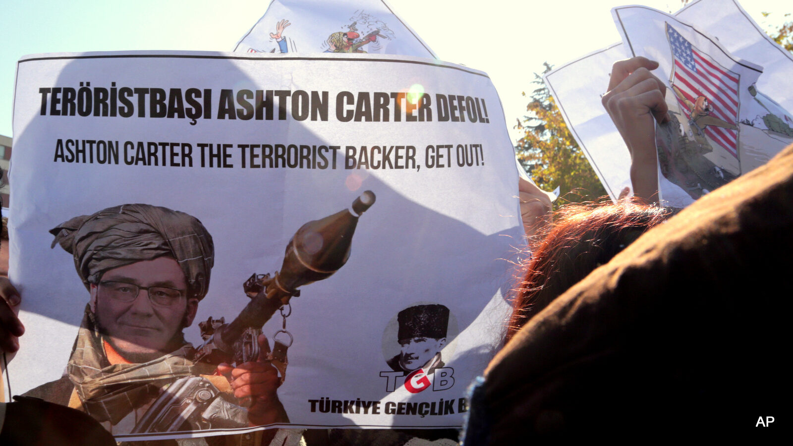 A group of young Turks stage an anti-US protest outside the Parliament before a visit by US Secretary of Defense Ash Carter in Ankara, Turkey, Frday, Oct. 21, 2016. Carter met with President Recep Tayyip Erdogan and other top leaders and defense officials in Ankara amid escalating tensions between Turkey and Iraq over Turkish military operations in northern Iraq as allied forces move to retake Mosul from ISIS.