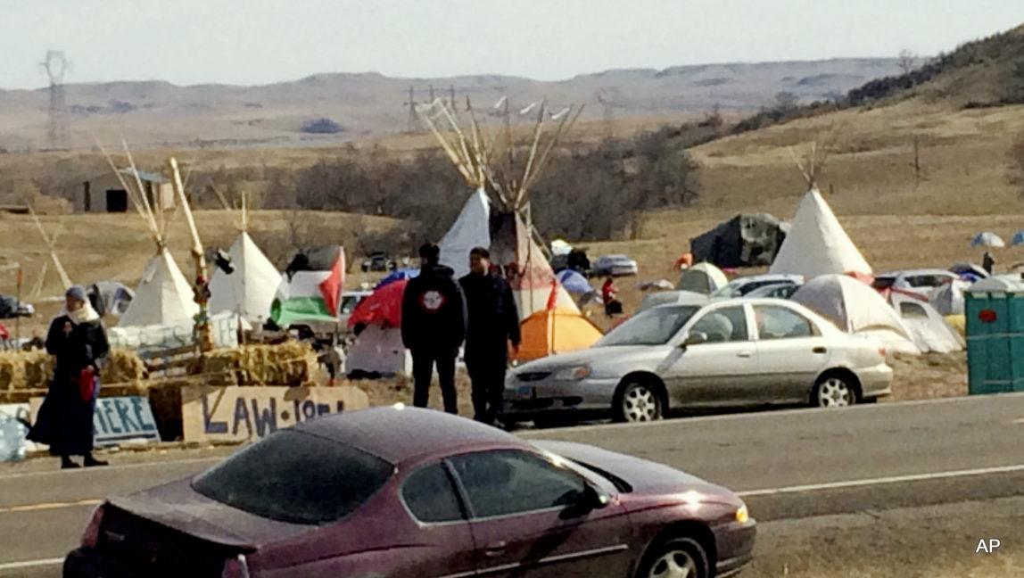 Teepees and numerous tents are set up Monday, Oct. 24, 2016, by Dakota Access oil pipeline protesters in southern North Dakota on property owned by the pipeline company in an attempt to halt construction of the controversial project.