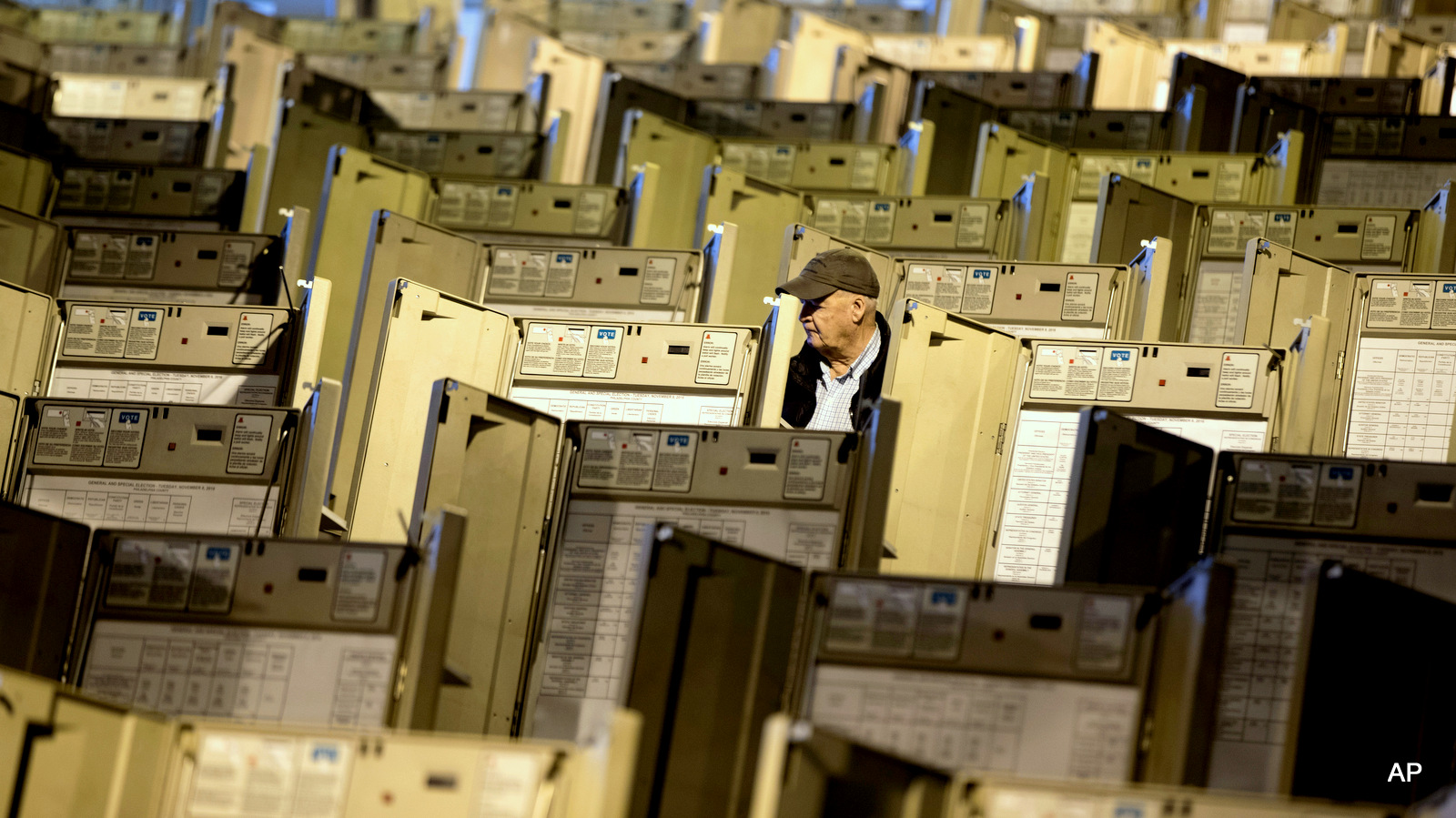 A technician works to prepare voting machines to be used in the upcoming presidential election, in Philadelphia, Friday, Oct. 14, 2016.