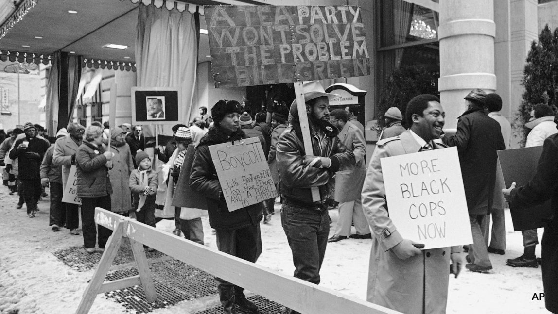 Members of the Guardian Civic League walk picket line in front of a Philadelphia hotel Jan. 15, 1982. The demonstration and a boycott was organized by black policemen who want the city hire more blacks on the police force.
