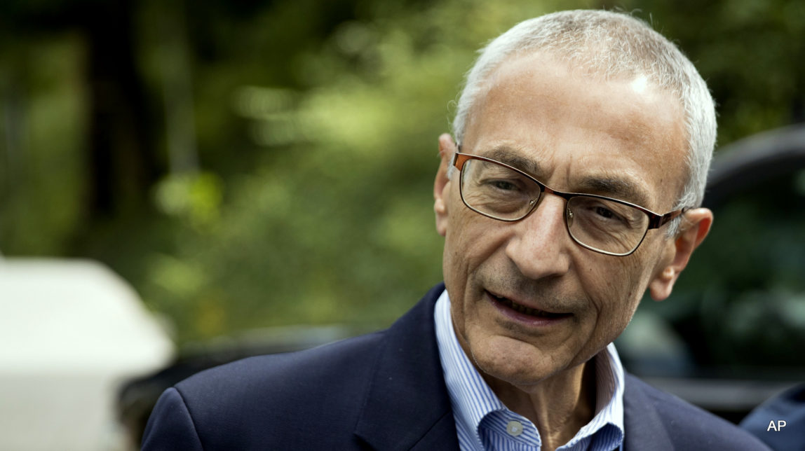 In this Oct. 5, 2016, photo, Hillary Clinton campaign chairman John Podesta speaks to members of the media outside Clinton's home in Washington. The WikiLeaks organization on Oct. 7, posted what it said were thousands of emails from Podesta, including some with excerpts from speeches she gave to Wall Street executives and others — speeches she has declined to release despite demands from Trump.