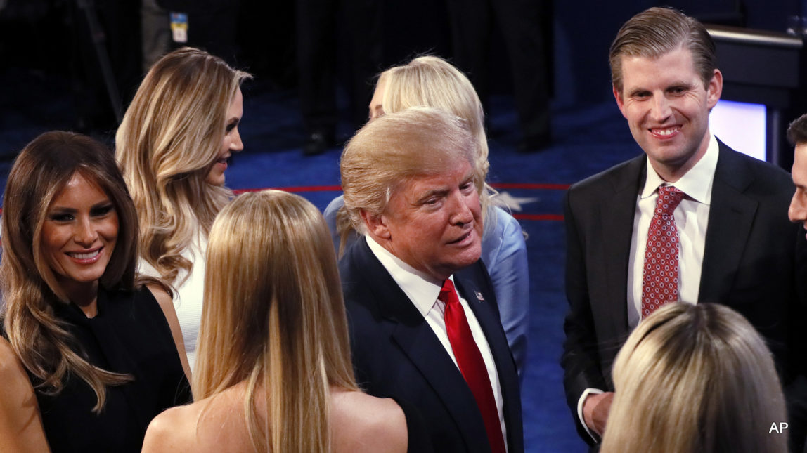 Republican presidential nominee Donald Trump is greeted by his family on stage after the third presidential debate at UNLV in Las Vegas, Wednesday, Oct. 19, 2016.