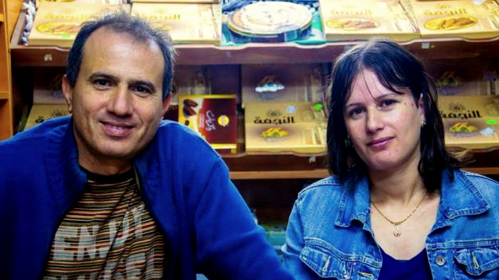 Omar Ziad with his wife pictured in his grocery store in Sofia, Bulgaria.