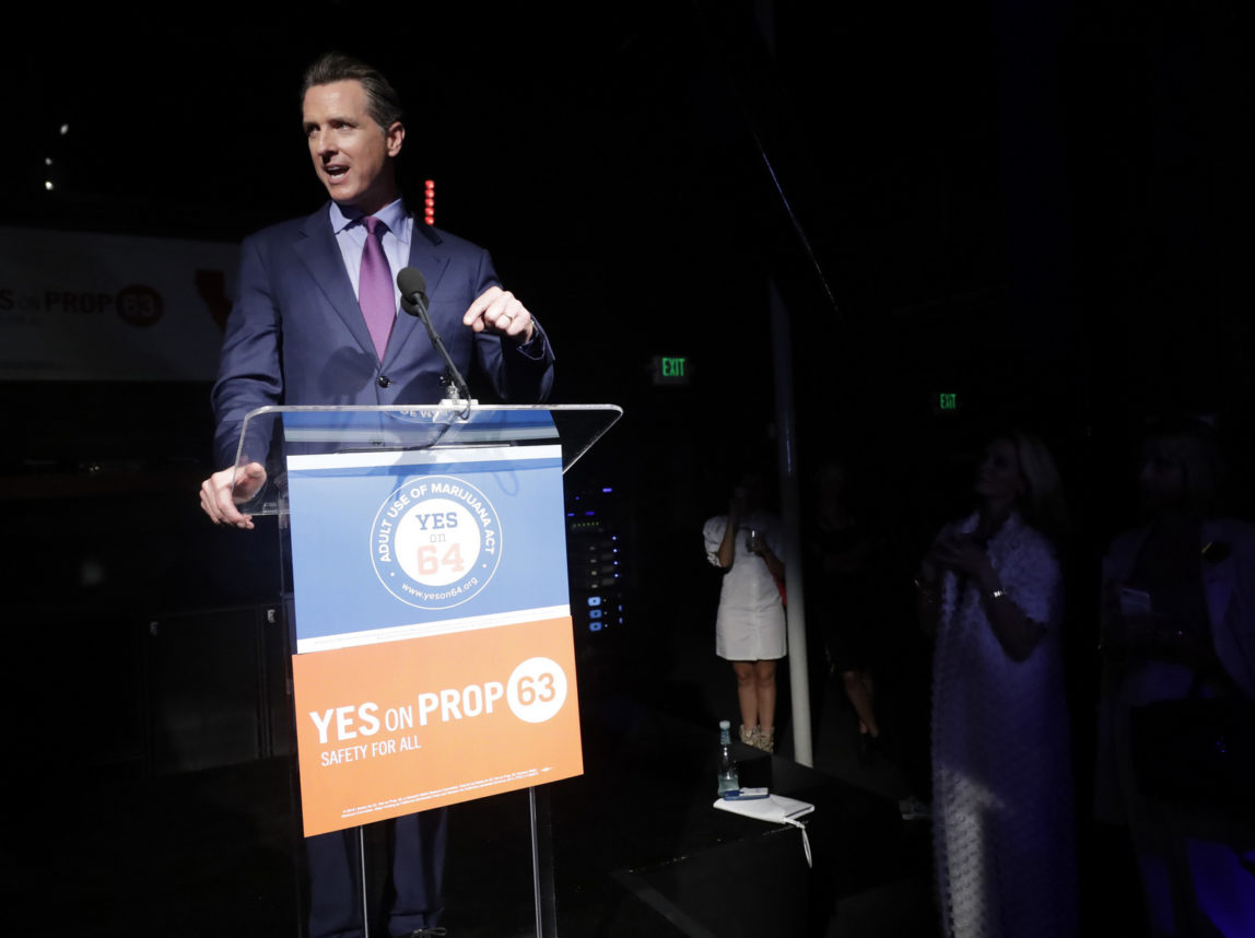 California Lt. Gov. Gavin Newsom speaks at a rally in support of Prop. 64 Tuesday, Nov. 8, 2016, in San Francisco. California voters approved a ballot measure Tuesday allowing recreational marijuana in the nation's most populous state. (AP Photo/Marcio Jose Sanchez)