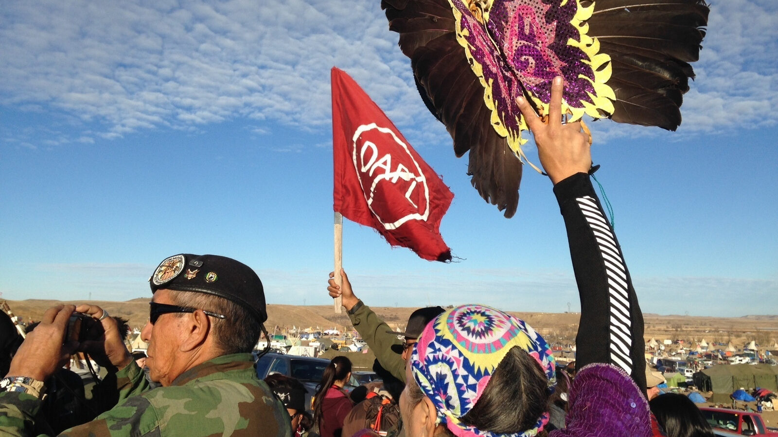 Demonstrators against the Dakota Access oil pipeline hold a ceremony at the main protest camp Tuesday, Nov. 15, 2016, near Cannon Ball, North Dakota. (AP Photo/James MacPherson)