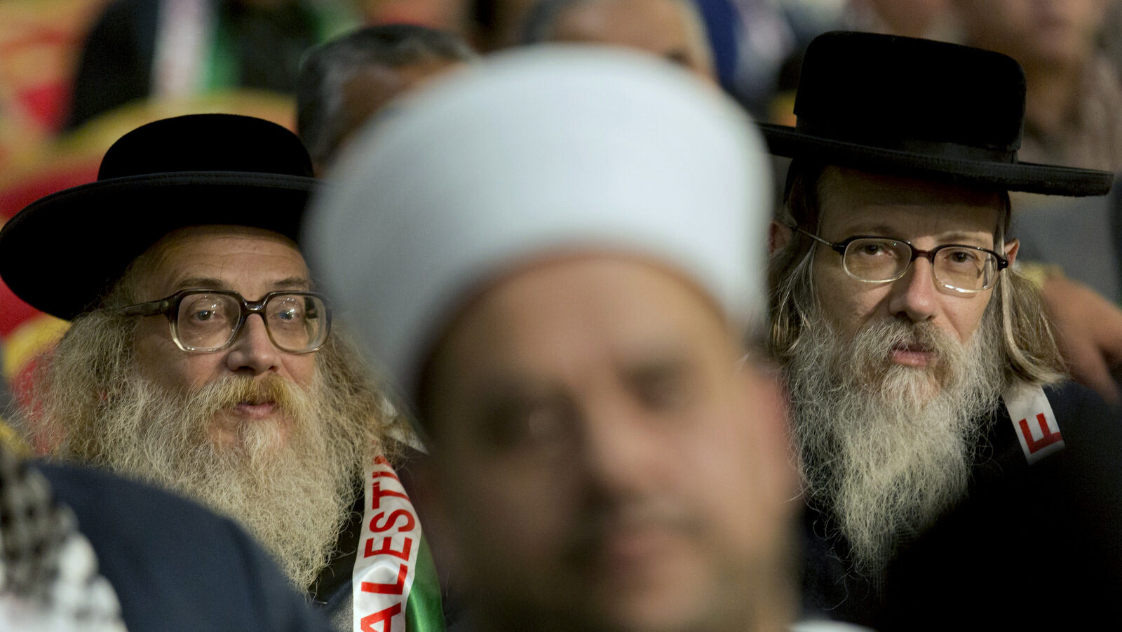 Jewish Rabbis and Muslim clerics attend the opening session of the Fatah party conference, in the West Bank city of Ramallah, Tuesday, Nov. 29, 2016. Palestinian Fatah movement holds its seventh conference in Ramallah with some fourteen hundred members participating and led by Palestinian President Mahmoud Abbas. The conference is to elect the party's two main decision making bodies. (AP Photo/Nasser Nasser)
