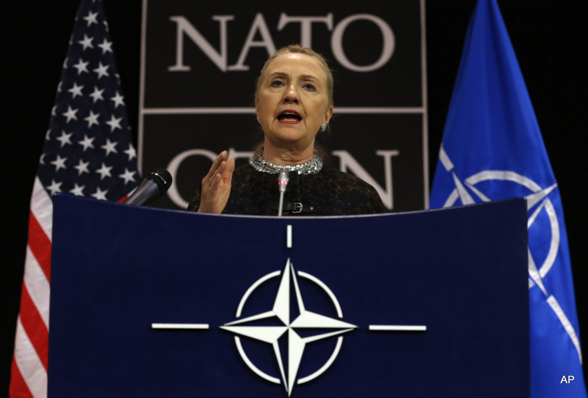 U.S. Secretary of State Hillary Clinton speaks during a news conference at NATO headquarters in Brussels, Belgium, December 5, 2012.