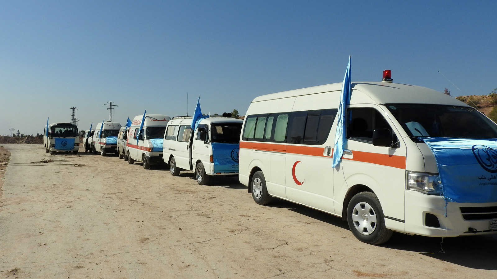 Ten ambulances wait at the Castello Road crossing to treat anyone exiting via the humanitarian corridors established by the Syrian government and Russia, including militants who lay down their arms. Nov. 4, 2016. (Photo: Eva Bartlett)
