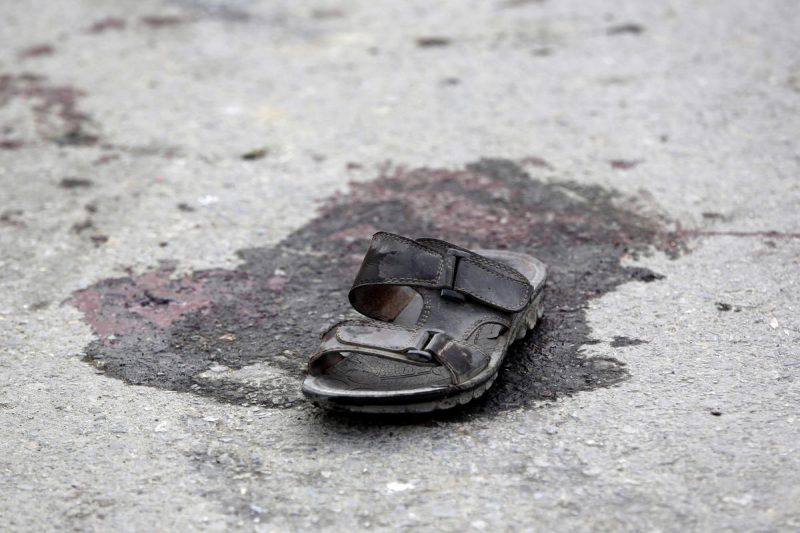 A victim's sandal is pictured near the Shiite Baqir-ul Ulom mosque after a suicide attack, in Kabul, Afghanistan, Monday, Nov. 21, 2016. An Afghan official says that dozens of civilians have been killed after a suicide bomber attacked a Shiite mosque in the capital. (AP Photos/Massoud Hossaini)