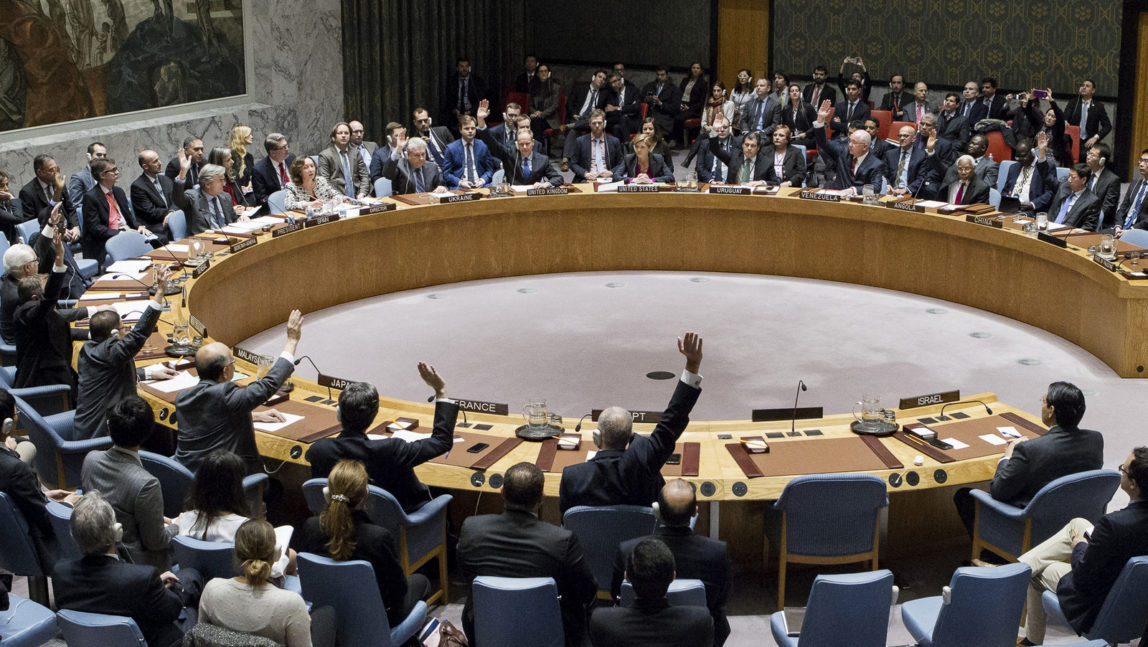 In this photo provided by the United Nations, members of the United Nations Security council vote at the United Nations headquarters on Friday, Dec. 23, 2016, in favor of condemning Israel for its practice of establishing settlements in the West Bank and east Jerusalem. In a striking rupture with past practice, the U.S. allowed the vote, not exercising its veto. (Manuel Elias/The United Nations via AP)