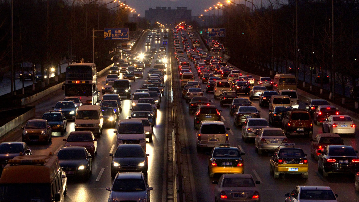 Vehicles pack a main road during rush hour in Beijing. China, which overtook the U.S. in late 2010 as the world's largest oil importer, has the single biggest influence on global demand for fuels. (AP Photo/Alexander F. Yuan)