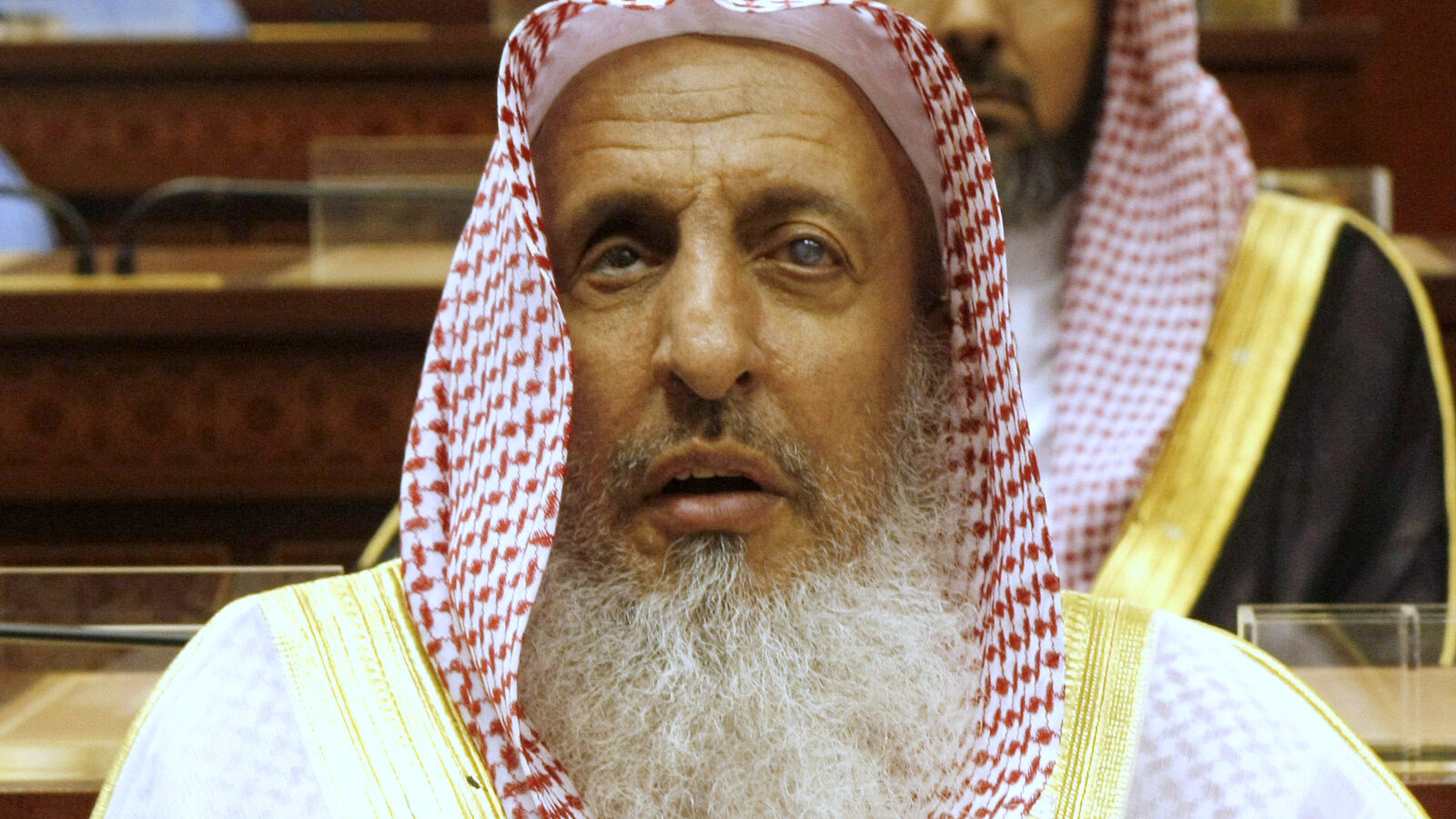 Saudi Arabia Salafist top cleric, Sheikh Abdul Aziz al-Sheikh, listens to a speech of King Abdullah of Saudi Arabia at the Consultative Council in Riyadh, Saudi Arabia. (AP Photo/Hassan Ammar, File)