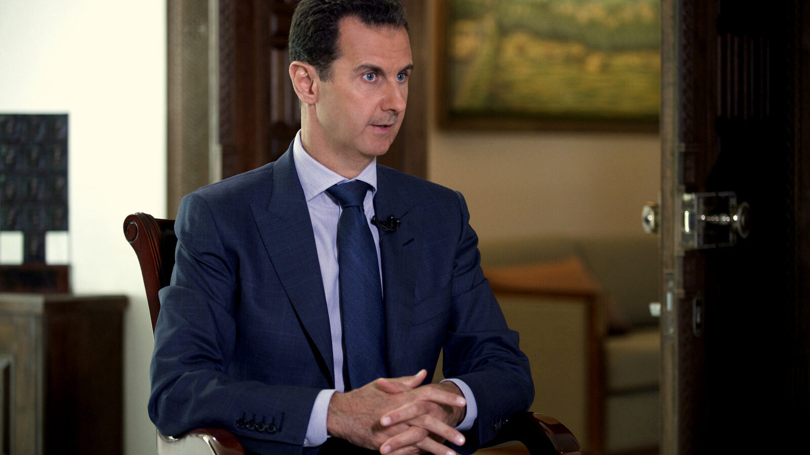 Syrian President Bashar Assad speaks to The Associated Press at the presidential palace in Damascus, Syria. (Syrian Presidency via AP, File)