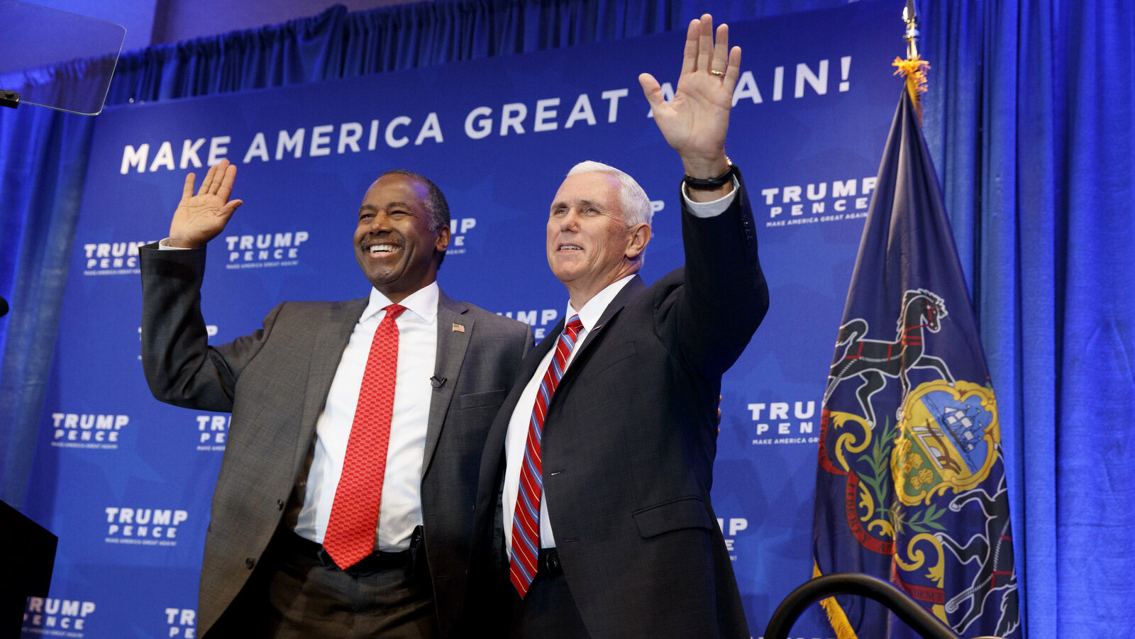 Dr. Ben Carson stands with Republican vice president-elect Mike Pence, before a speech on healthcare by Republican presidential candidate Donald Trump, Tuesday, Nov. 1, 2016, in King of Prussia, Pa. (AP Photo/ Evan Vucci)