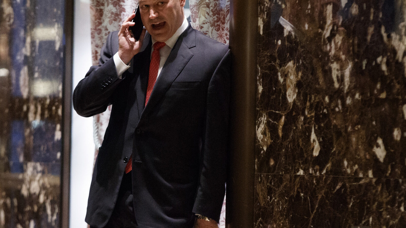 Goldman Sachs COO Gary Cohn talks on the phone as he waits for the start of a meeting with President-elect Donald Trump at Trump Tower, Tuesday, Nov. 29, 2016, in New York. (AP Photo/Evan Vucci)