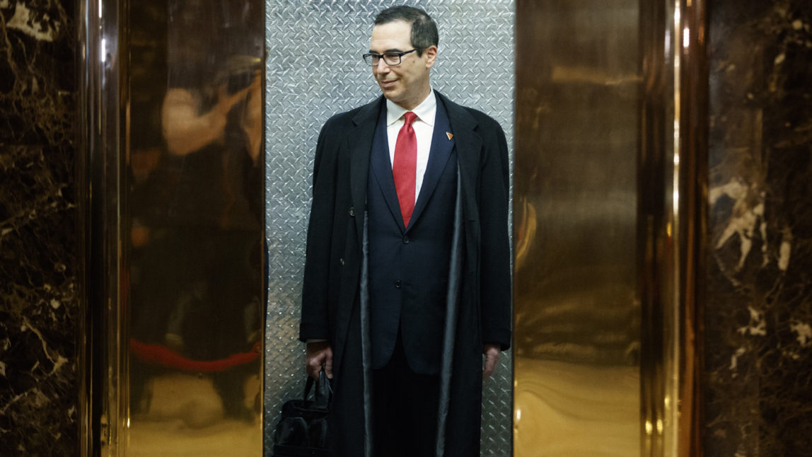 Steven Mnuchin, President-elect Donald Trump's nominee for Treasury Secretary, gets on an elevator after speaking with reporters in the lobby of Trump Tower, Wednesday, Nov. 30, 2016, in New York. (AP Photo/Evan Vucci)