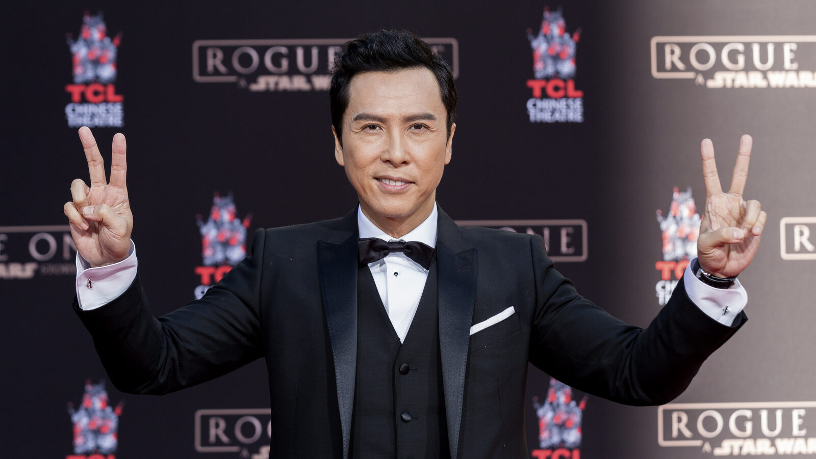 Actor Donnie Yen, of "Rogue One: A Star Wars Story," appears at his hand and footprint ceremony at the TCL Chinese Theatre on Wednesday, Nov. 30, 2016, in Los Angeles. (Photo by Willy Sanjuan/Invision/AP)