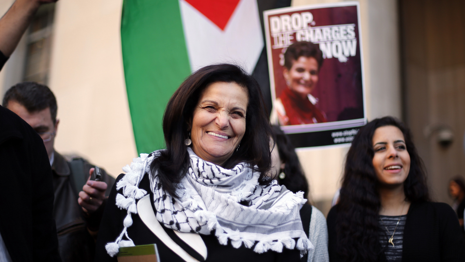 Rasmea Odeh smiles after leaving federal court in Detroit Thursday, March 12, 2015. (AP Photo/Paul Sancya)