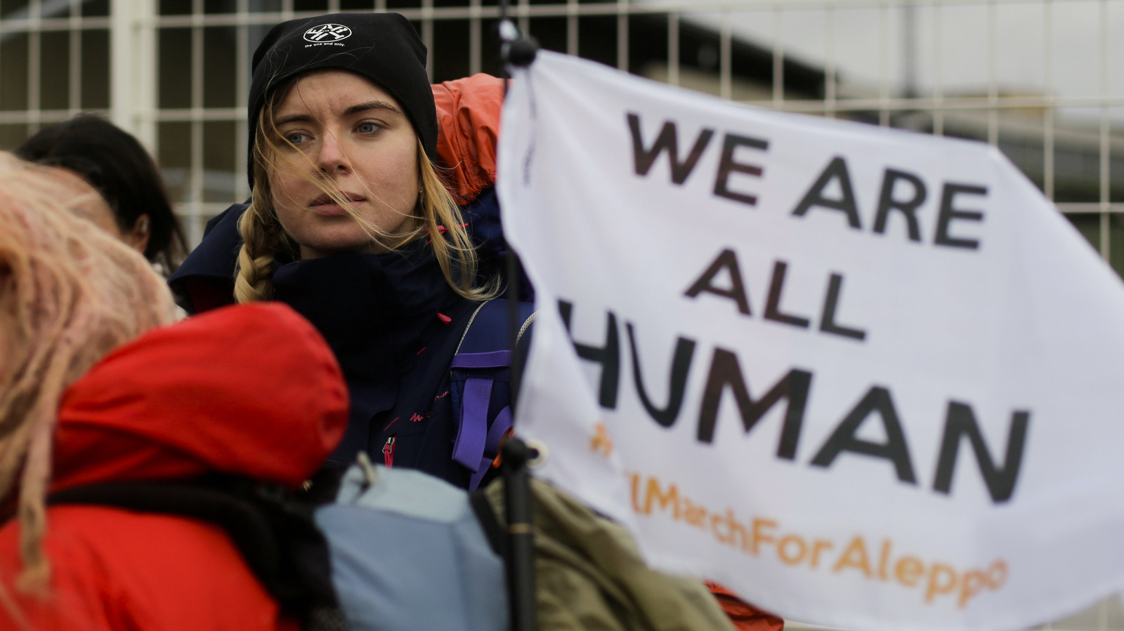 Activists await the launch of the Civil March for Aleppo at the air field of the former airport Tempelhof in Berlin, Monday, Dec. 26, 2016. (AP/Markus Schreiber)