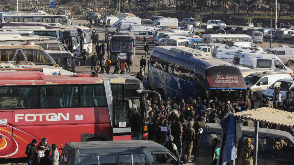 Syrians evacuated from the embattled Syrian city of Aleppo during the ceasefire arrive at a refugee camp in Rashidin, near Idlib, Syria, Tuesday, Dec. 20, 2016. (AP Photo)