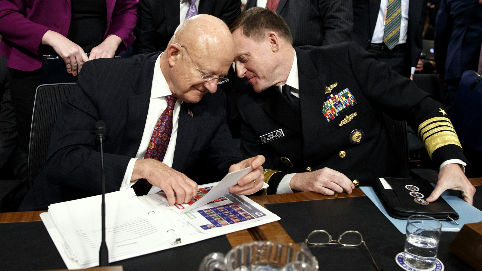 Director of National Intelligence James Clapper, left, talks with National Security Agency and Cyber Command chief Adm. Michael Rogers on Capitol Hill in Washington, Thursday, Jan. 5, 2017, at the conclusion of a Senate Armed Services Committee hearing: "Foreign Cyber Threats to the United States." (AP/Evan Vucci)