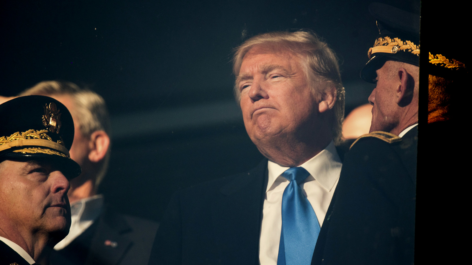 President-elect Donald Trump, center, listens to a member of the military in the stands as he watches an Army-Navy NCAA college football game at M&T Bank Stadium, Saturday, Dec. 10, 2016, in Baltimore. (AP/Andrew Harnik)